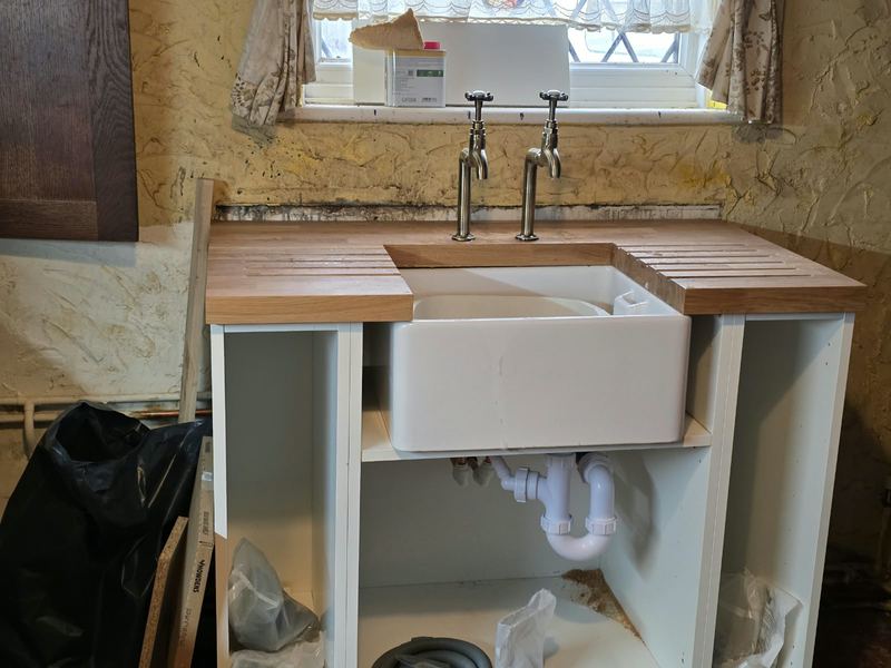 A Belfast sink set in a new timber stand.